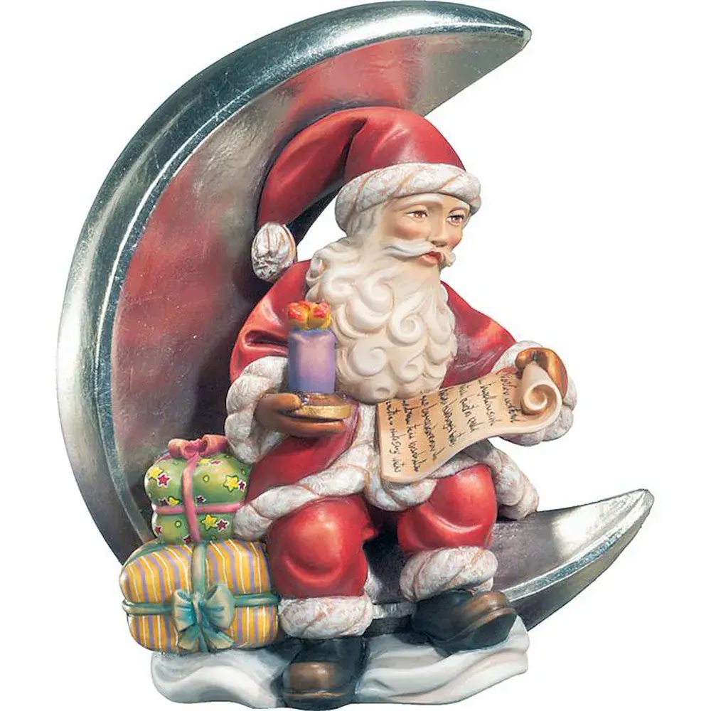 Babbo Natale con luna e candela