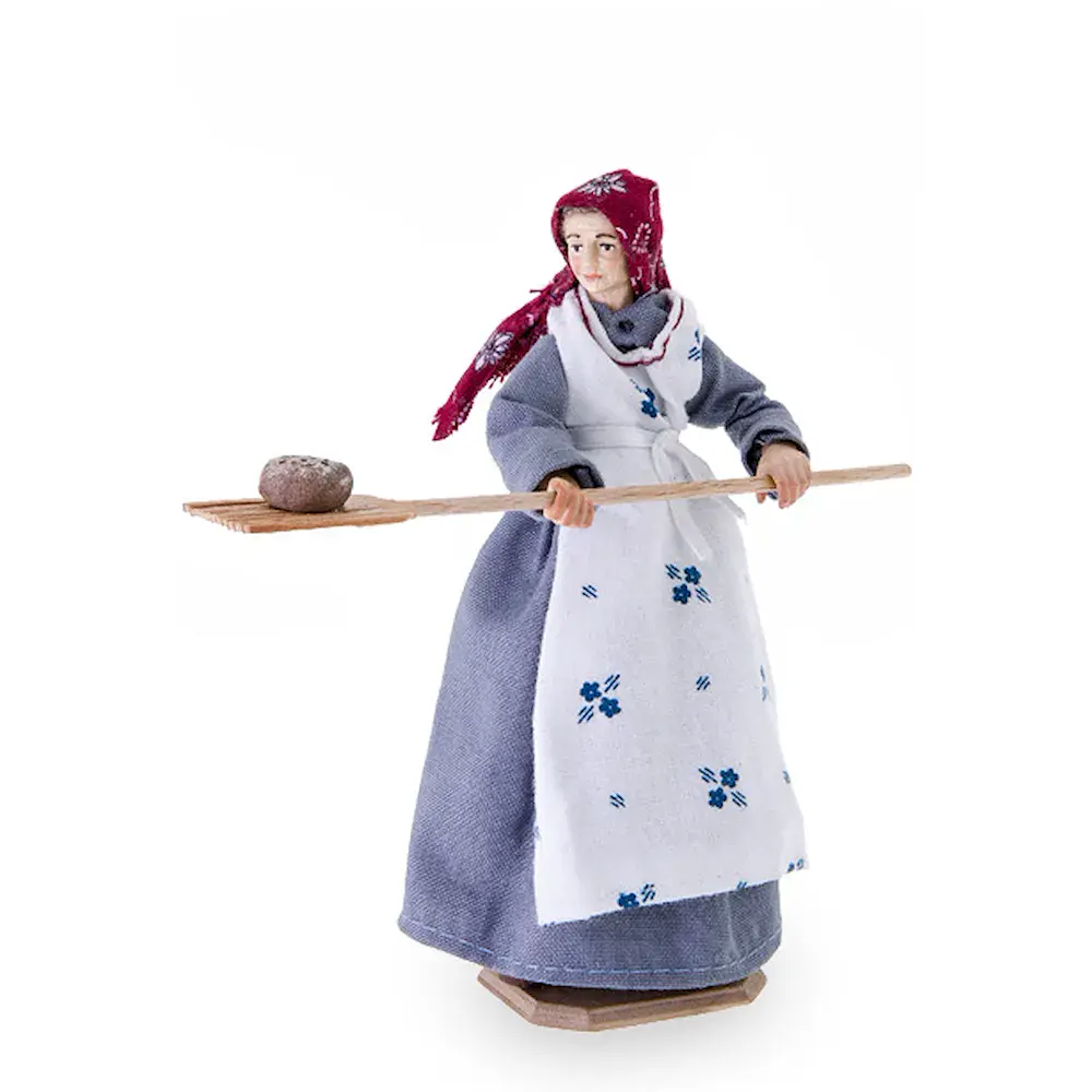 Farmer's wife with bread-shovel