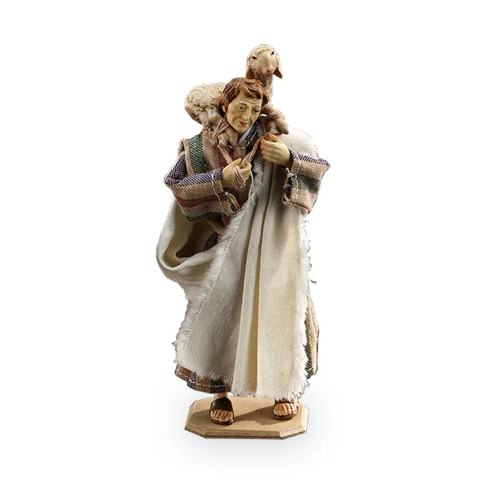 Shepherd with lamb on the shoulders
