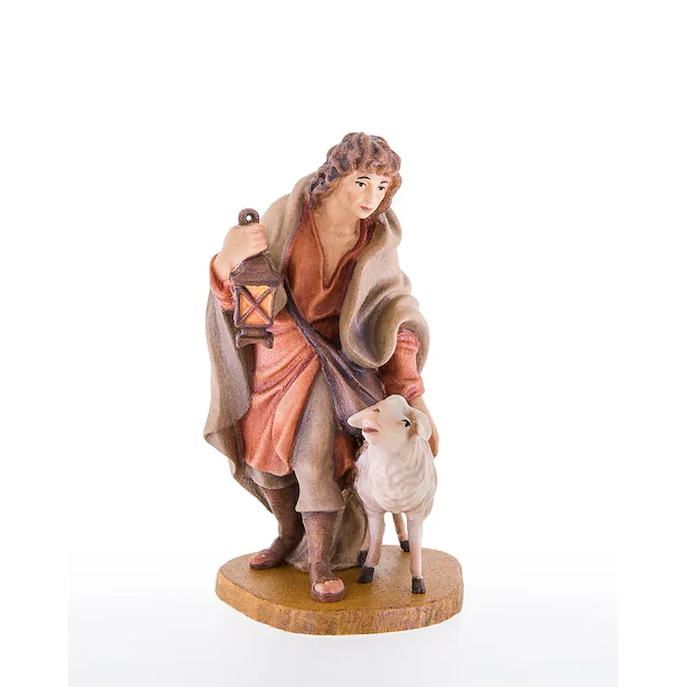 Shepherd with sheep and lantern