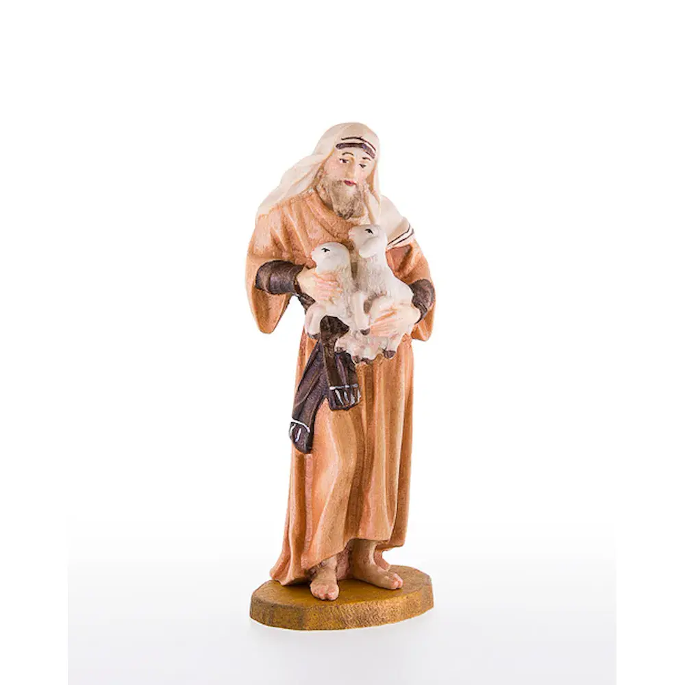 Pastor oriental con corderos