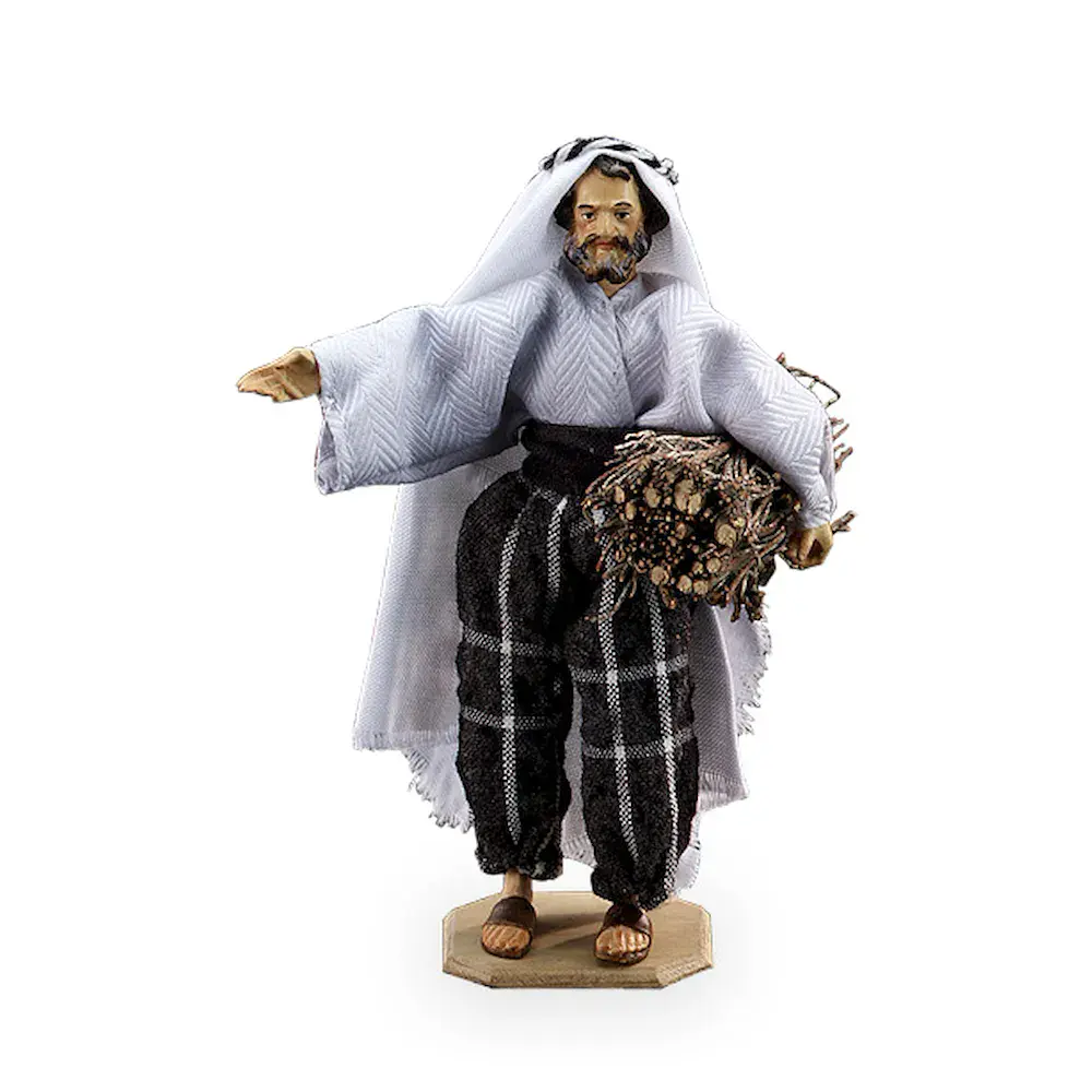 Pastor con el ramo de ramas secas