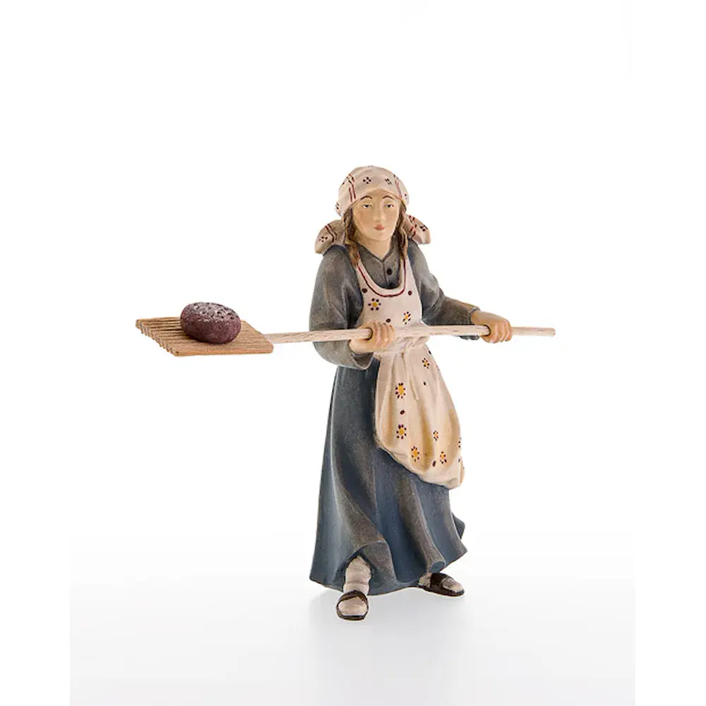 Campesina con la pala del horno