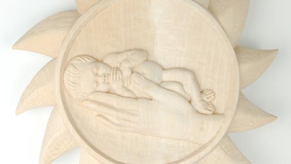 Sun with hand and baby